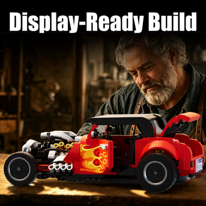 Adult builder with the completed Blaze Street Rod hot rod model on a workbench