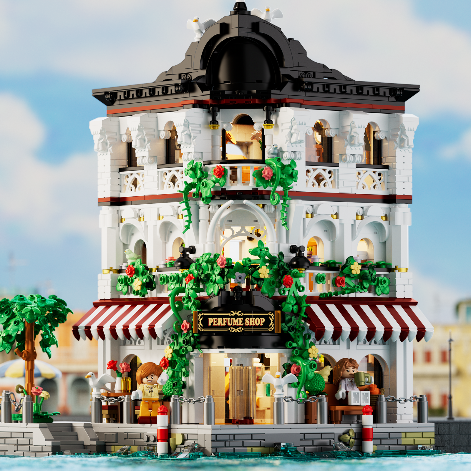 Front view of IAMBRICK Riverside Perfume Shop with striped awnings, flowers and balconies